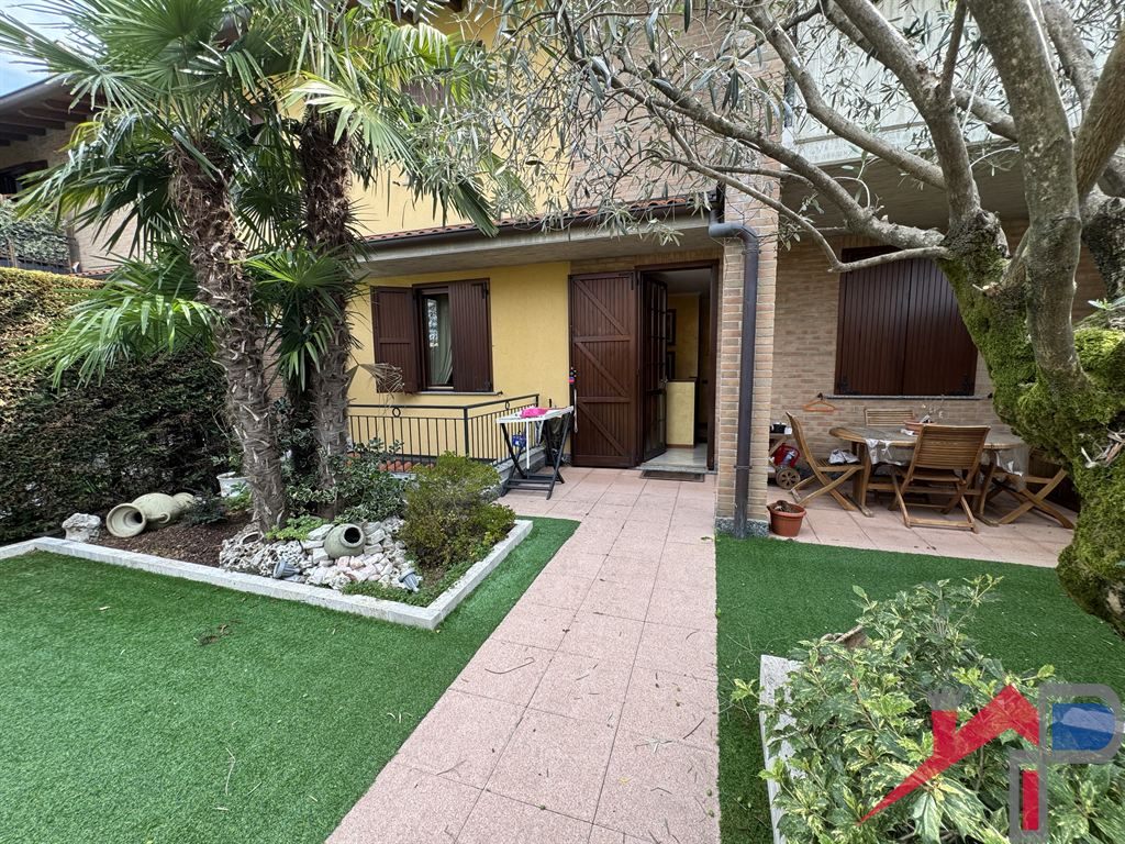Appartamento con Giardino e Taverna Ristrutturata a Ponte San Pietro